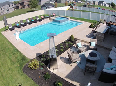 inground pool with concrete surround